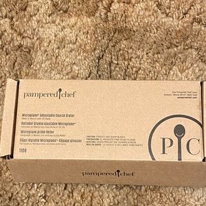 pampered chef microplane adjusted grater.